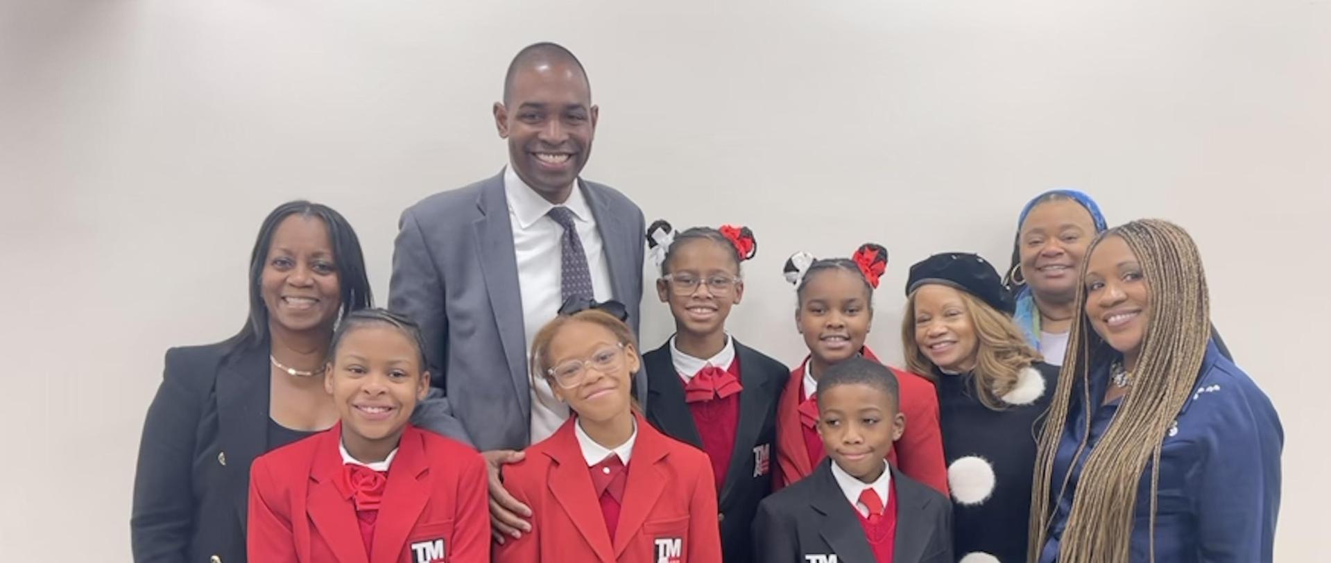 Students from TMALS with the lieutenant governor and deputy superintendent