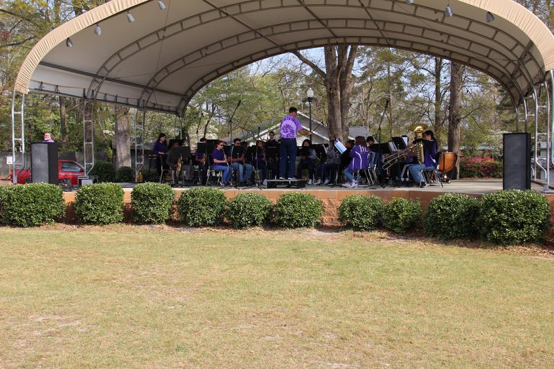 The B-L Middle School/B-L High School Honor Band performs as part of Arts in the Park at Leesville College Park on March 30th. Around 500 people attended the event.