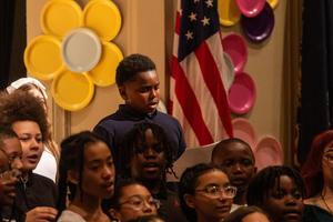 Chorus members perform