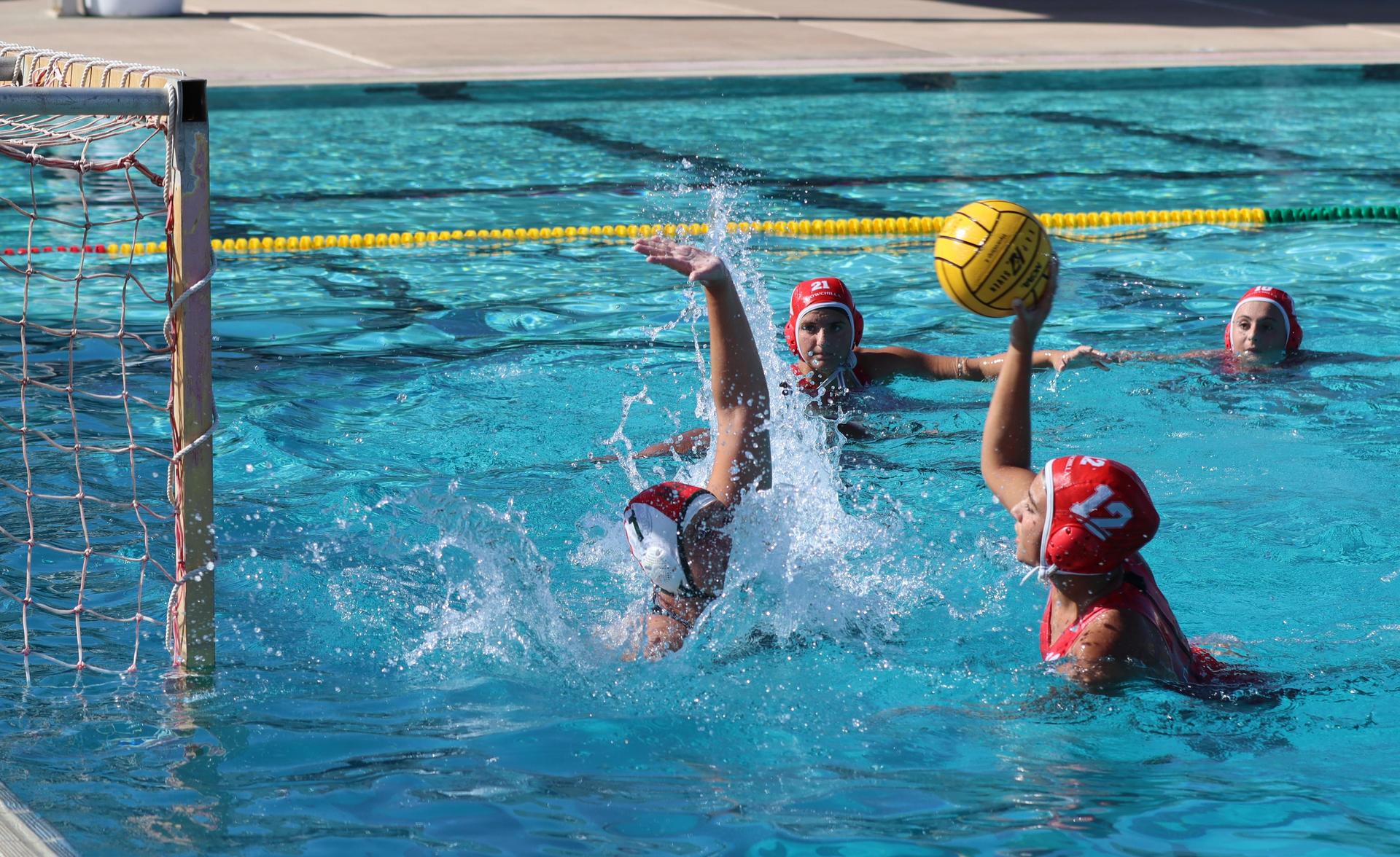 girls playing water polo against Hoover