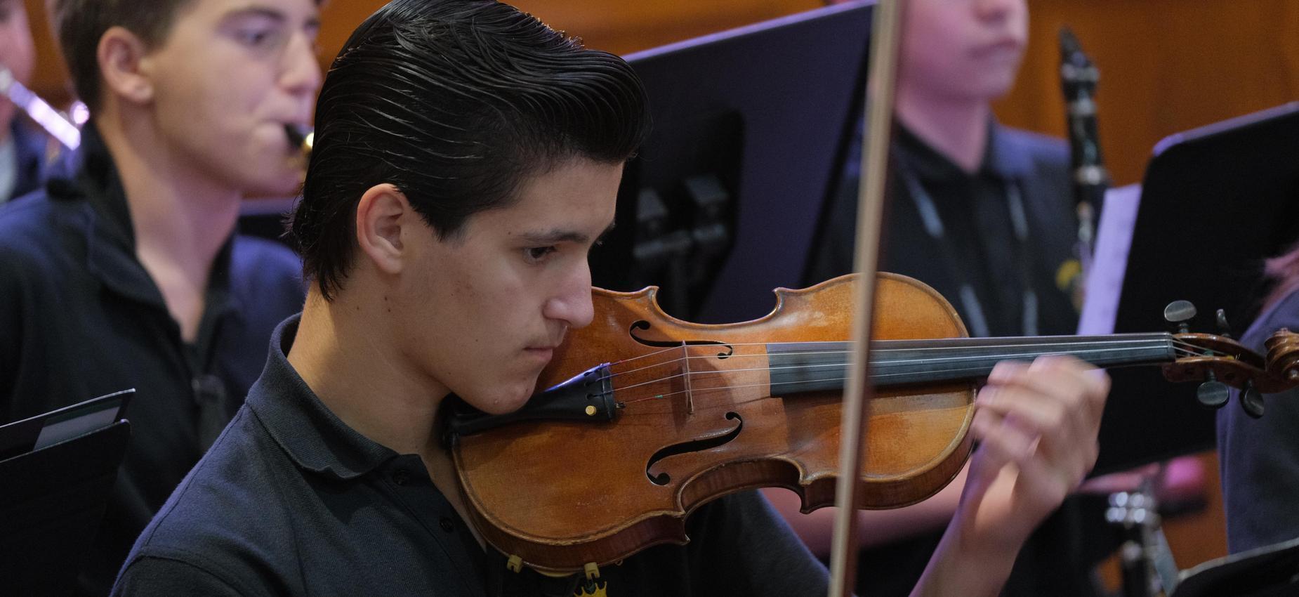 Student playing violin