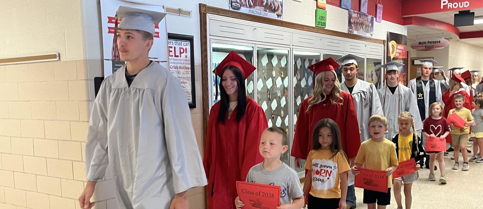 Class of 2026 with the Class of 2038 walk