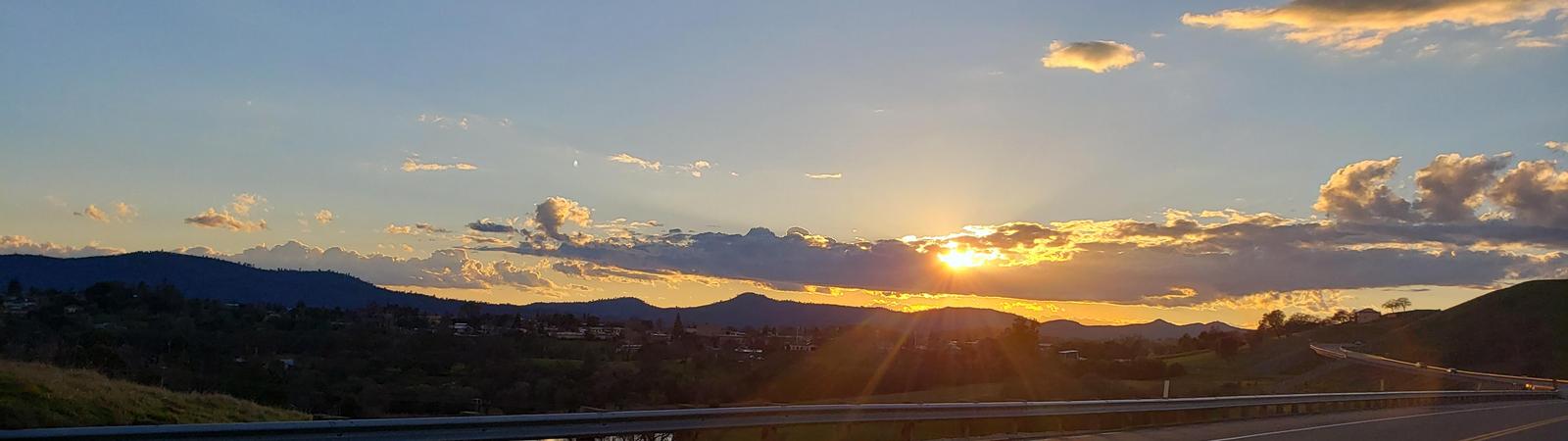 sunset along a road
