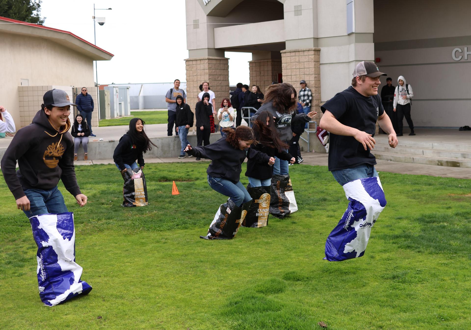 students and staff enjoying the feed bag relay