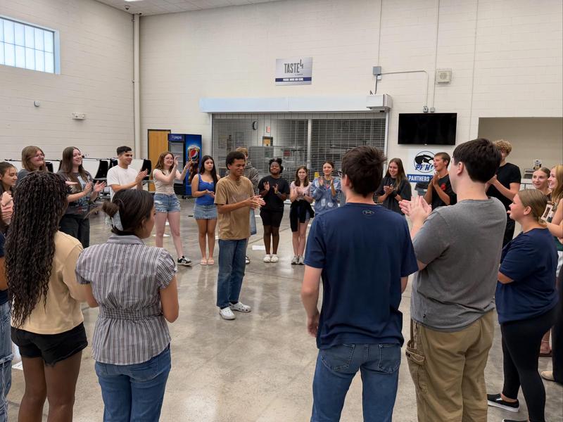 photos of students clapping
