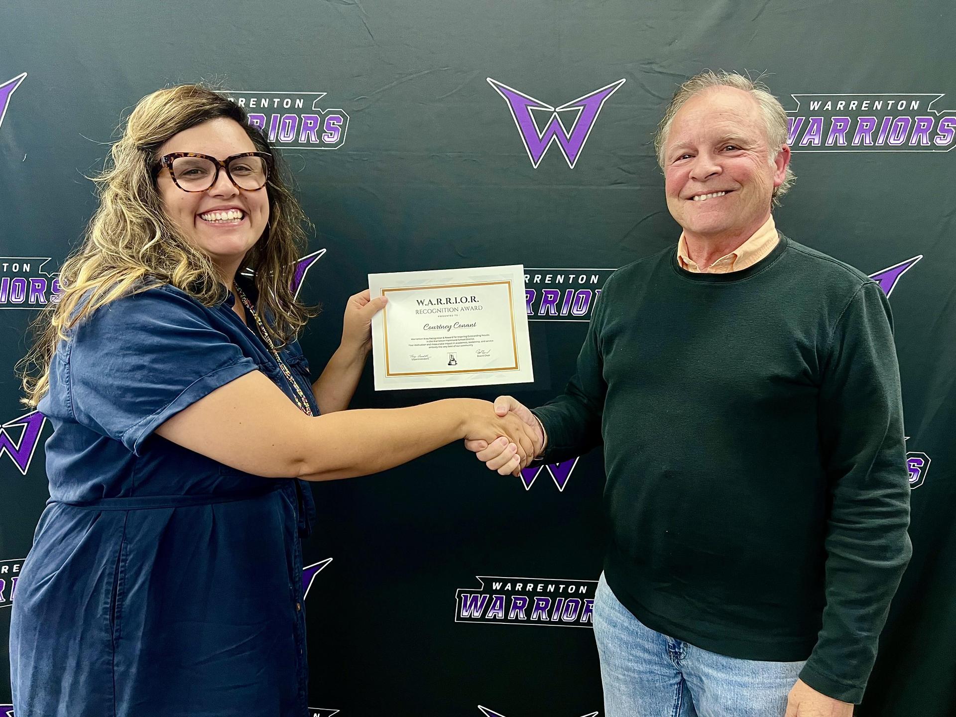 Courtney Conant Receiving the first WARRIOR Award