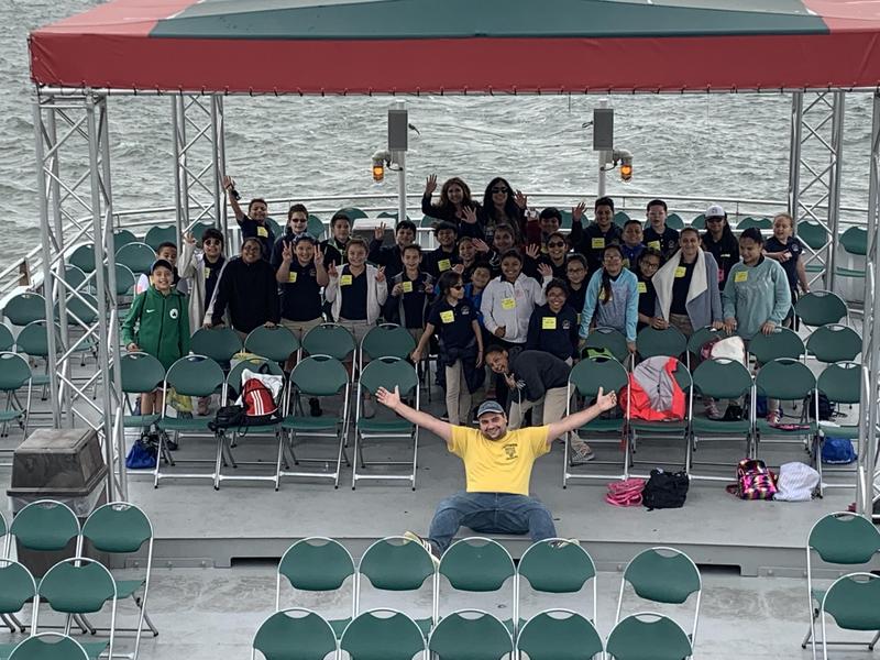 group photo at the back of the boat