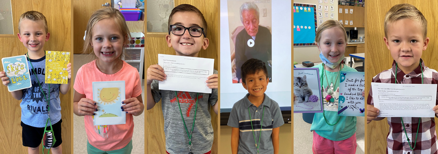 6 young students holding greeting cards from their grandparents