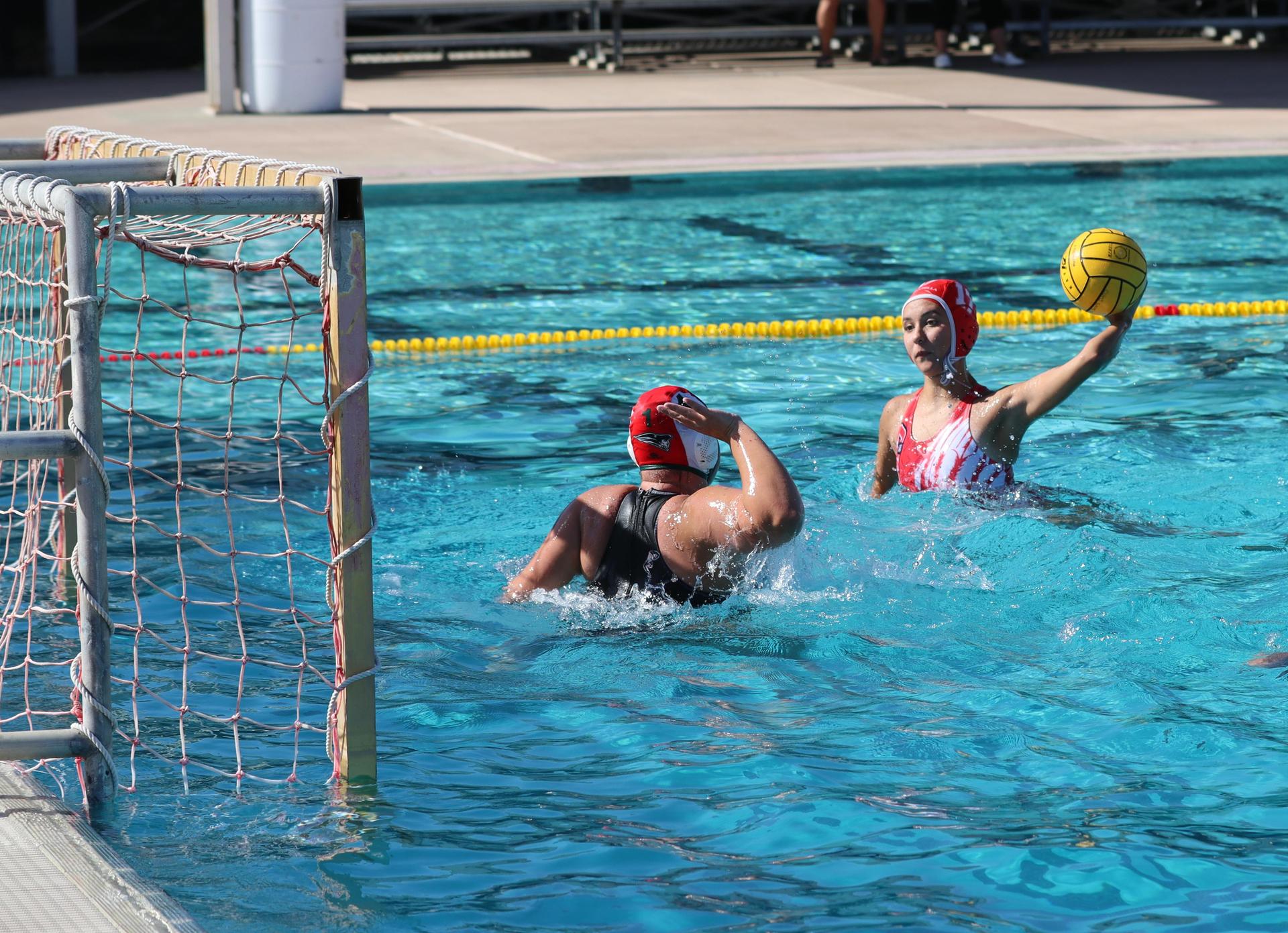 girls playing water polo against Hoover
