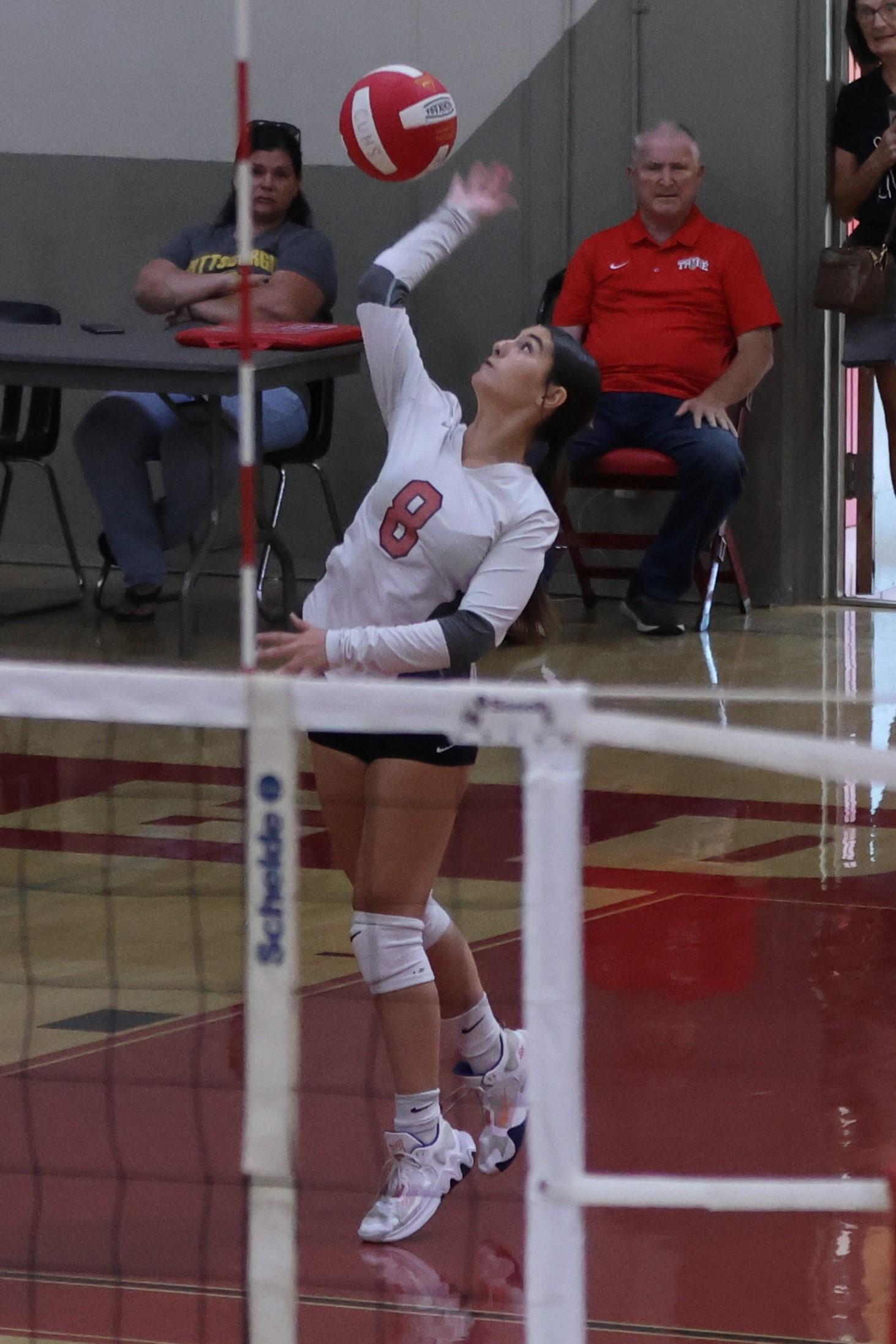 junior varsity girls playing volleyball 74