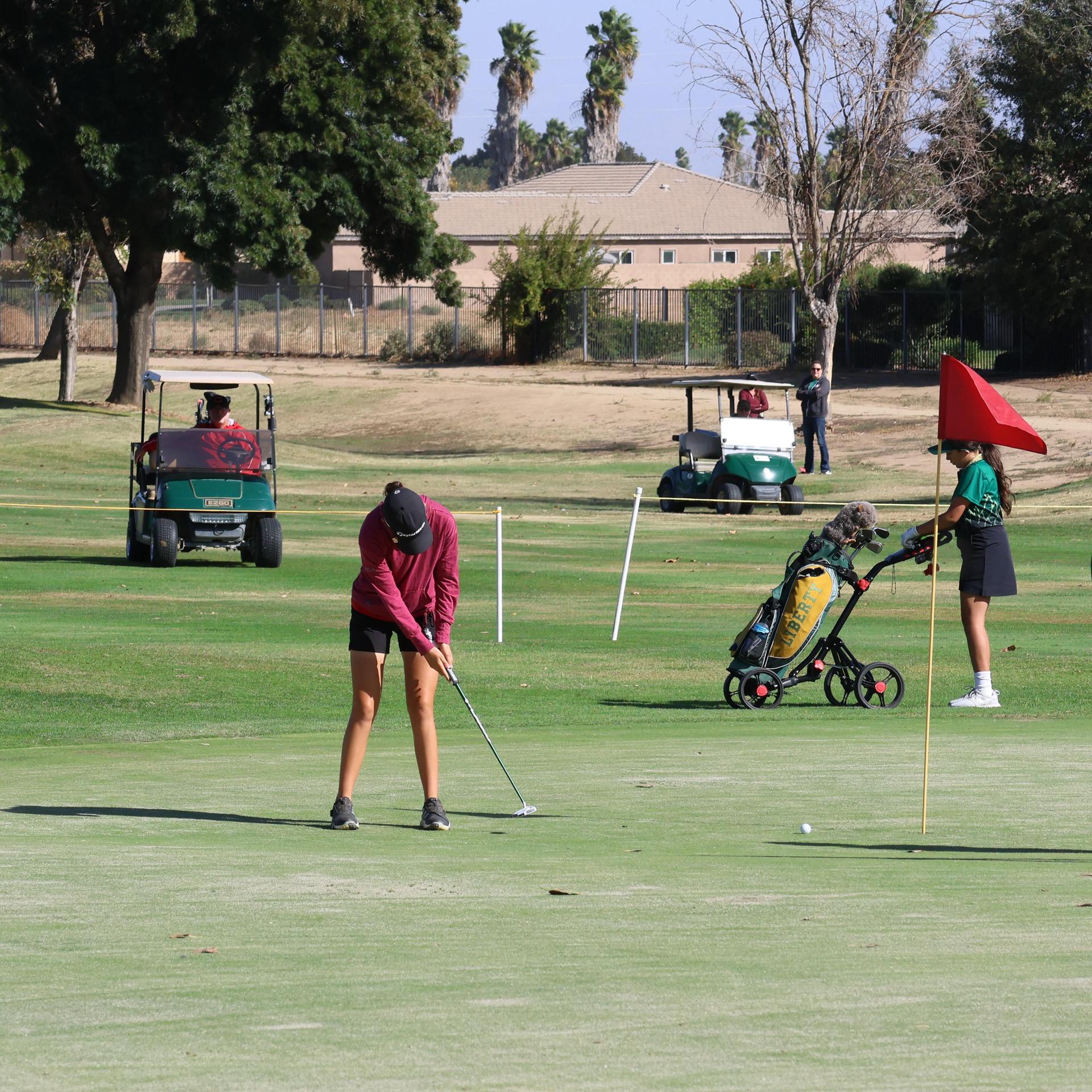 Girls golfers in action at the championships