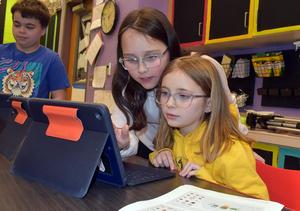 Students using an iPad