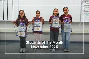Students holding a bag