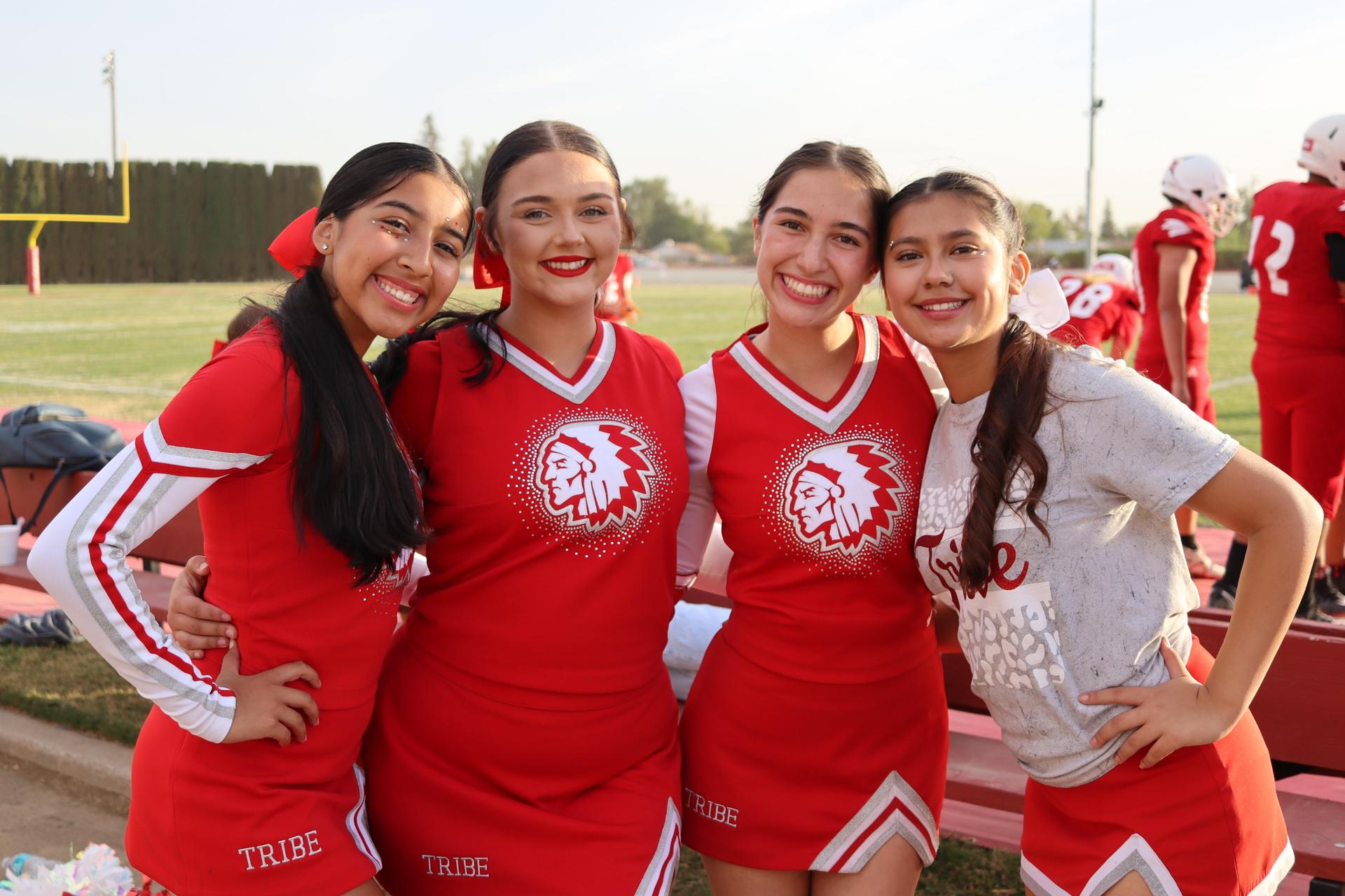 junior varsity cheerleaders in action at the Riverdale game