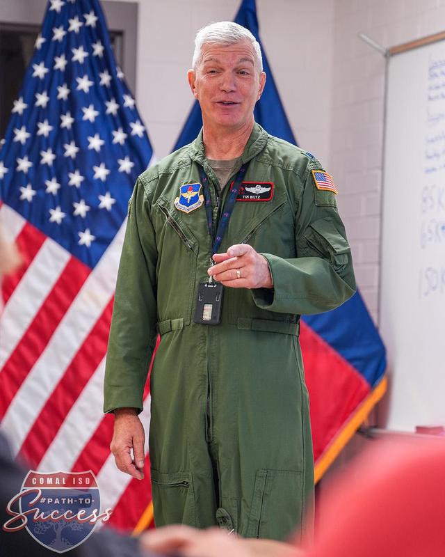 Canyon High School JROTC instructor Lieutenant Colonel Biltz teaching his students in class.