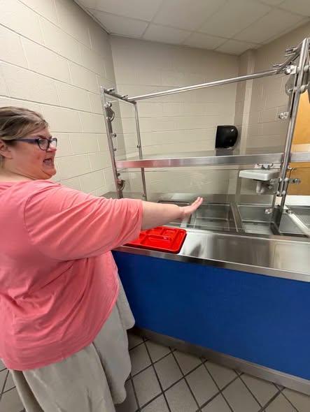 Ms. Jessica Willis, PCHS c/o ‘98 & Child Nutrition Supervisor, shows off the new serving line at PCHS.