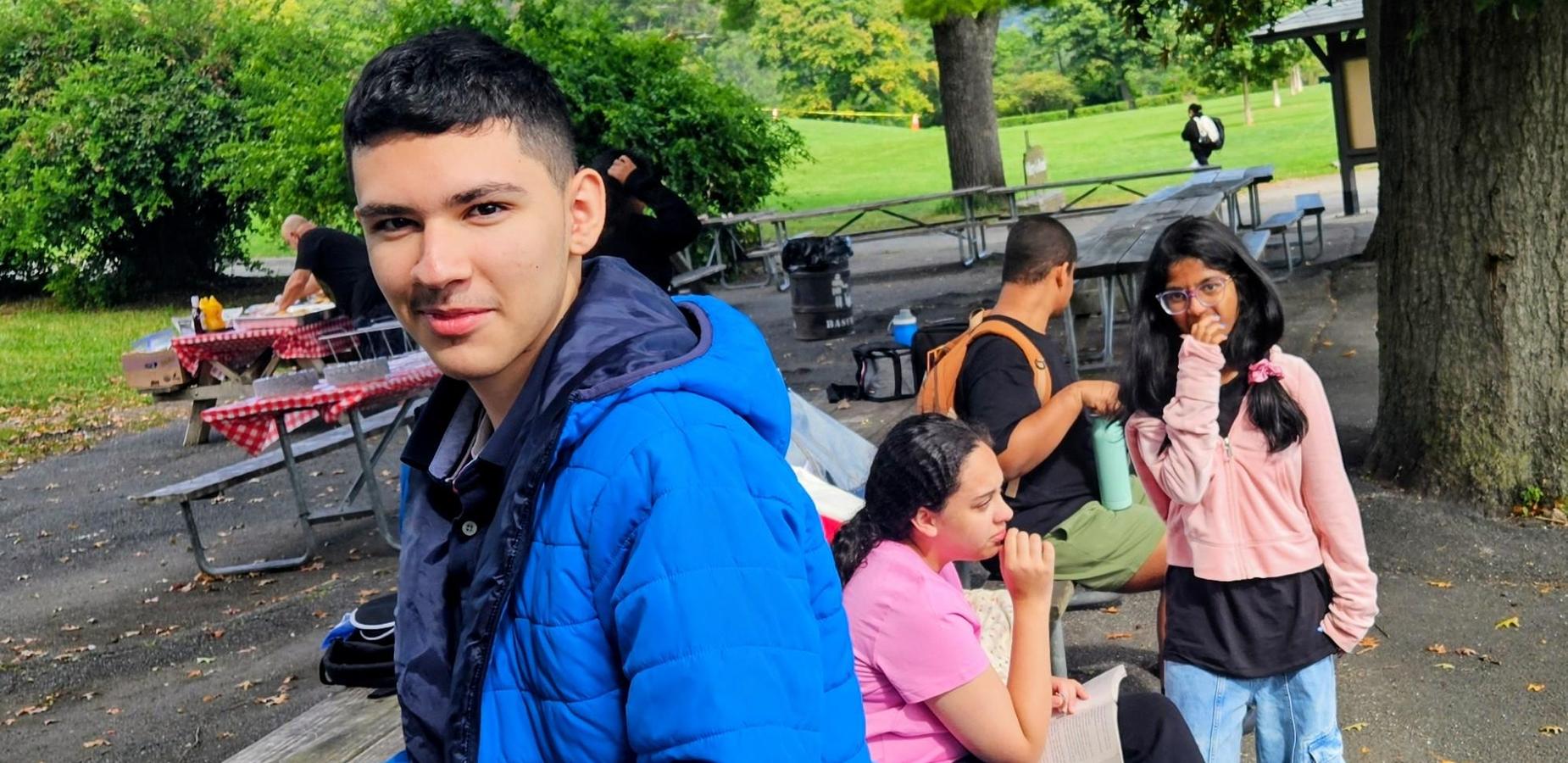 Students pose for community building trip.