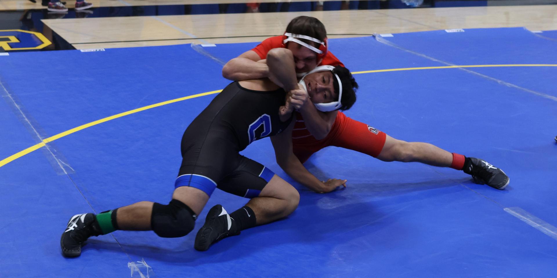 wrestlers in action at parlier