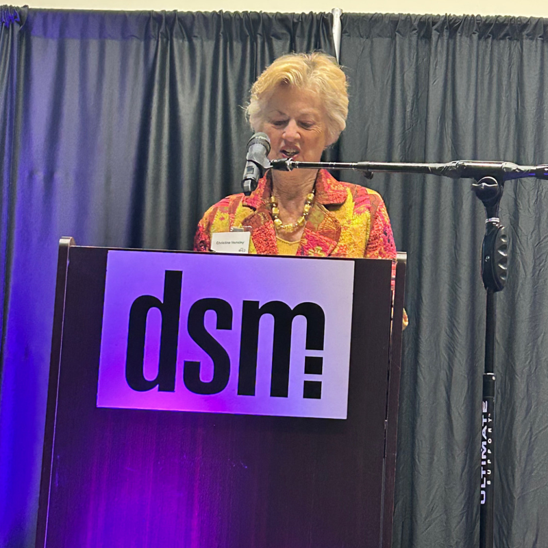 Christine Hensley speaking at dsm magazine's event