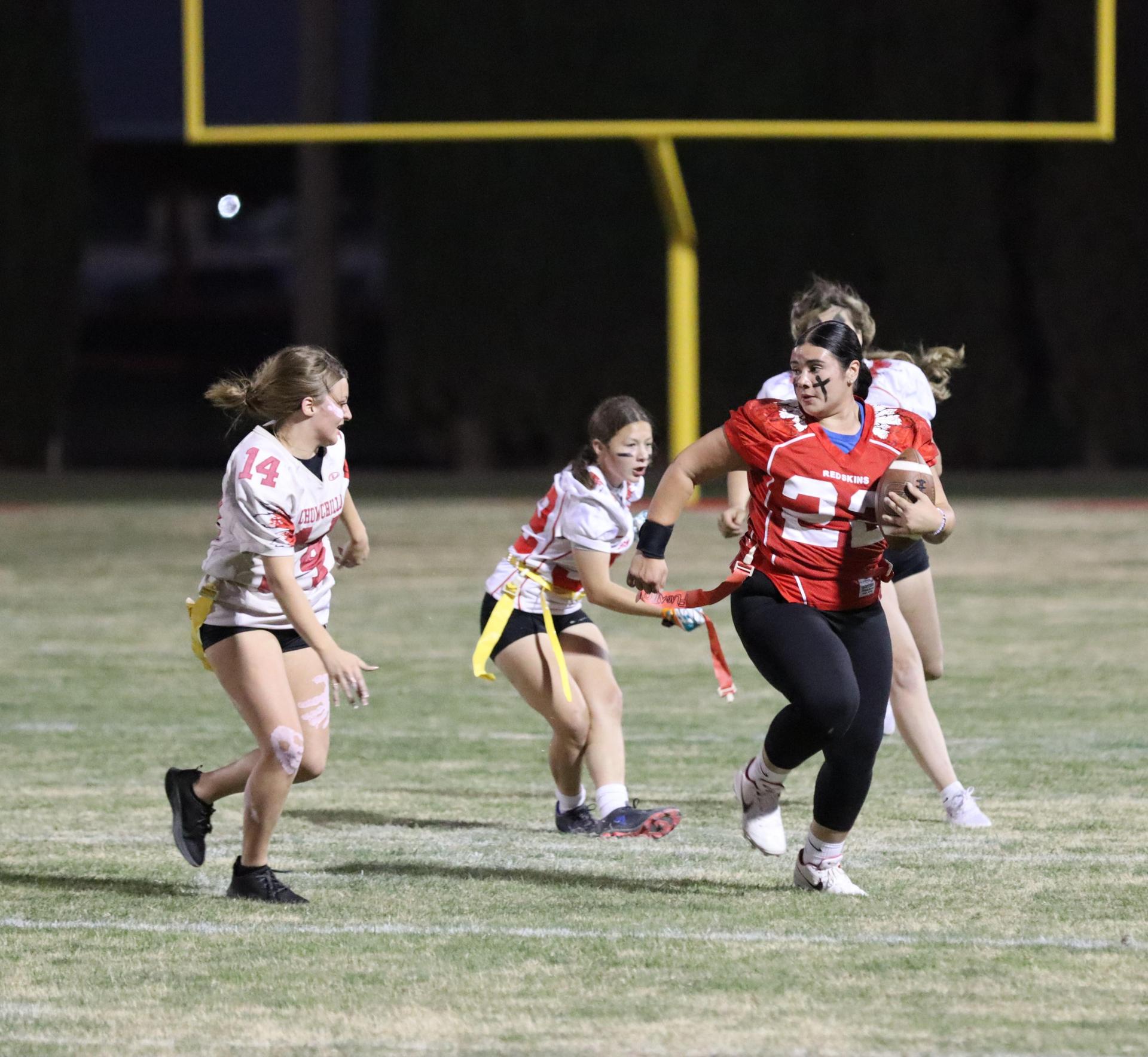 girls playing flag football