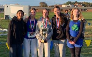 NW Varsity Girls Cross Country team!  The team concluded their successful season by achieving the prestigious title of Co-