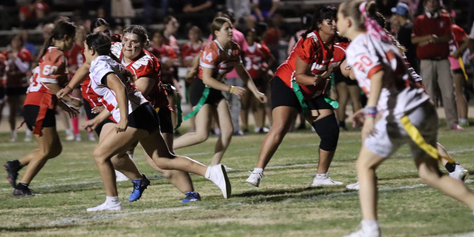 girls playing flag football