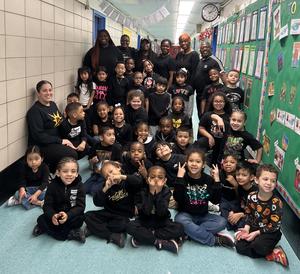 Staff and students wearing black