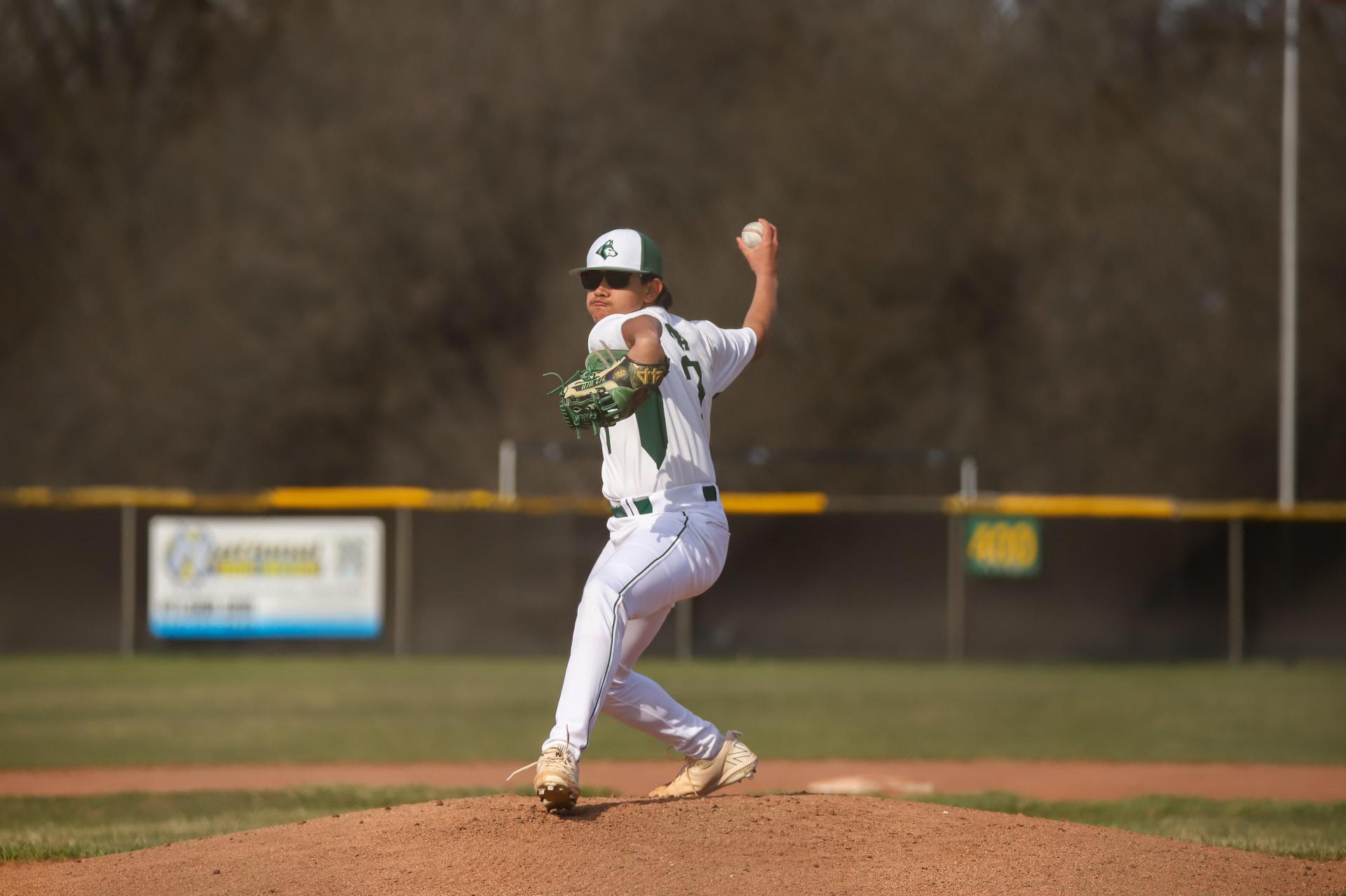 Baseball pitcher throwing the ball