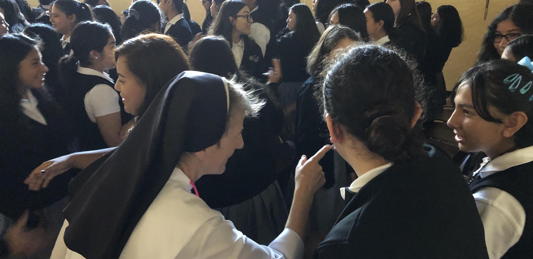 students and faculty at mass