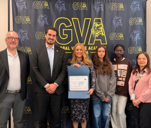 GVA Aurora Staff holding certificate with representatives from LabelFrancEducation