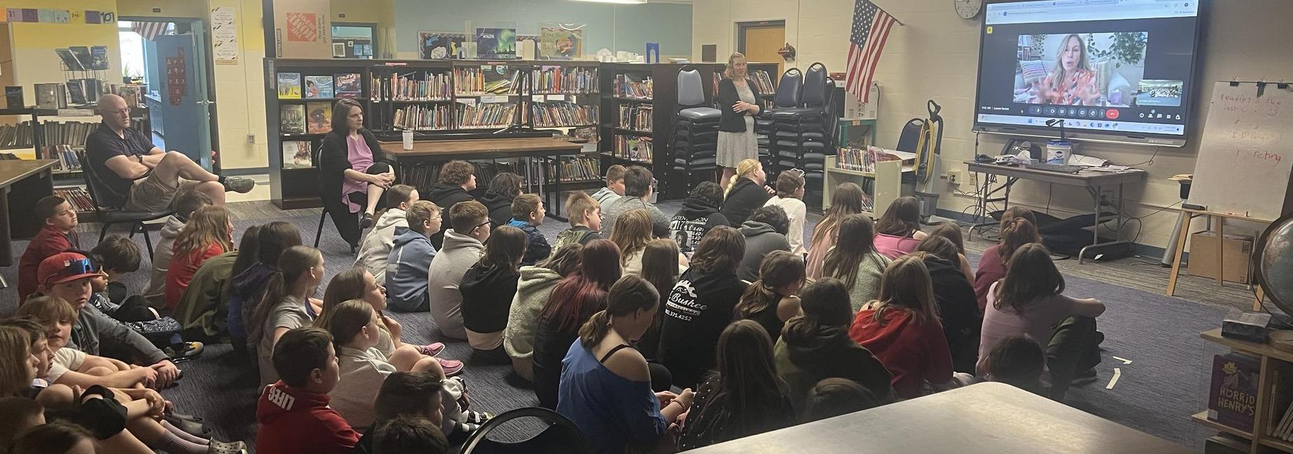 a group of students learning in the library