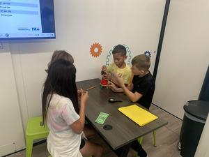 Students collaborate on building a circuit