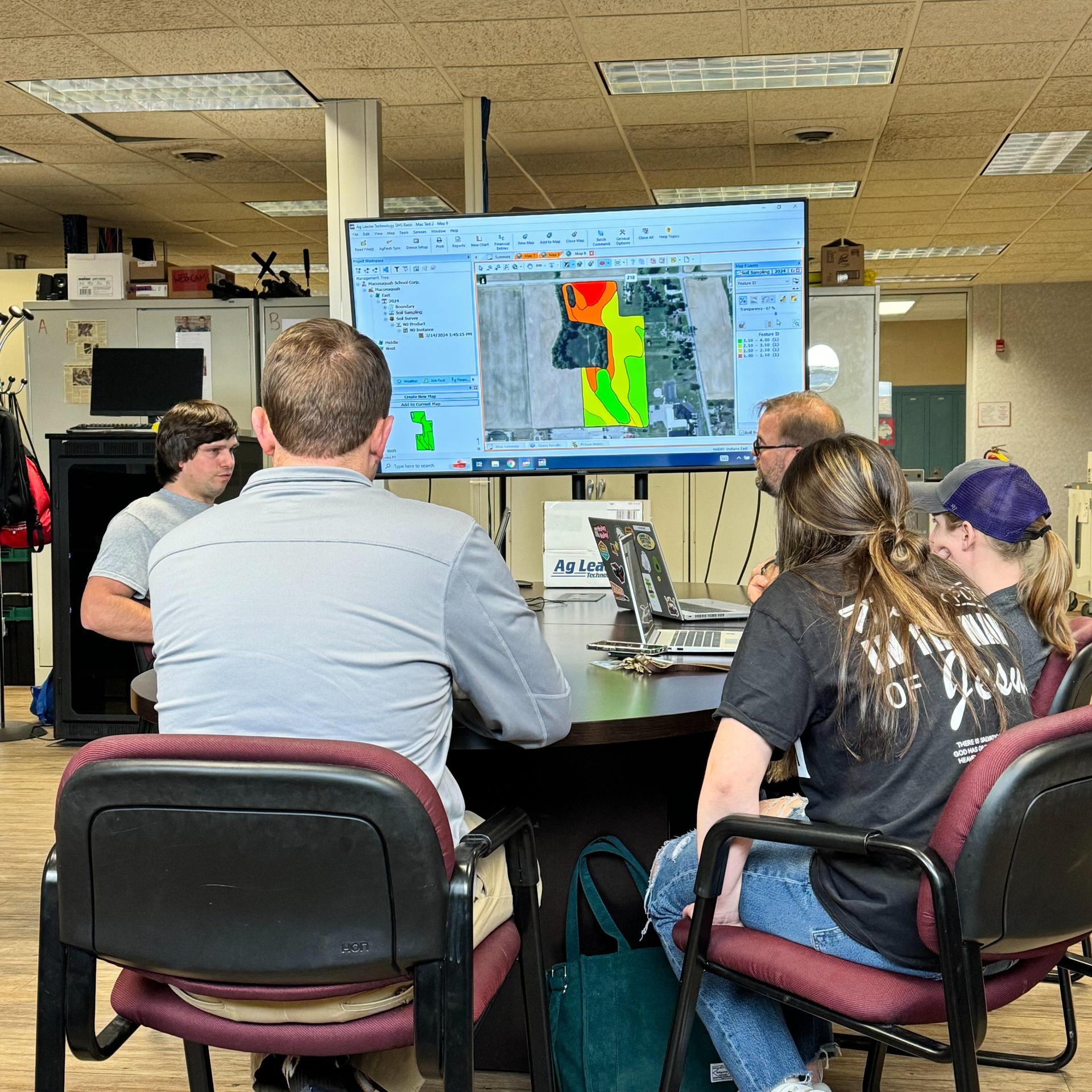 Tech Tribe students working or learning