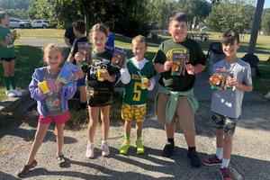 3rd-graders Ryann Dulemba, Ruby Mortimore, Maverick Conley, Louie Humberston, and Nolan Cole won books by hitting a target during the slingshot activity