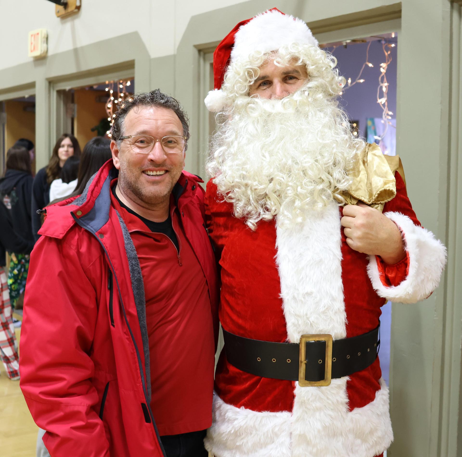 students and staff posing at the winter wishes rally