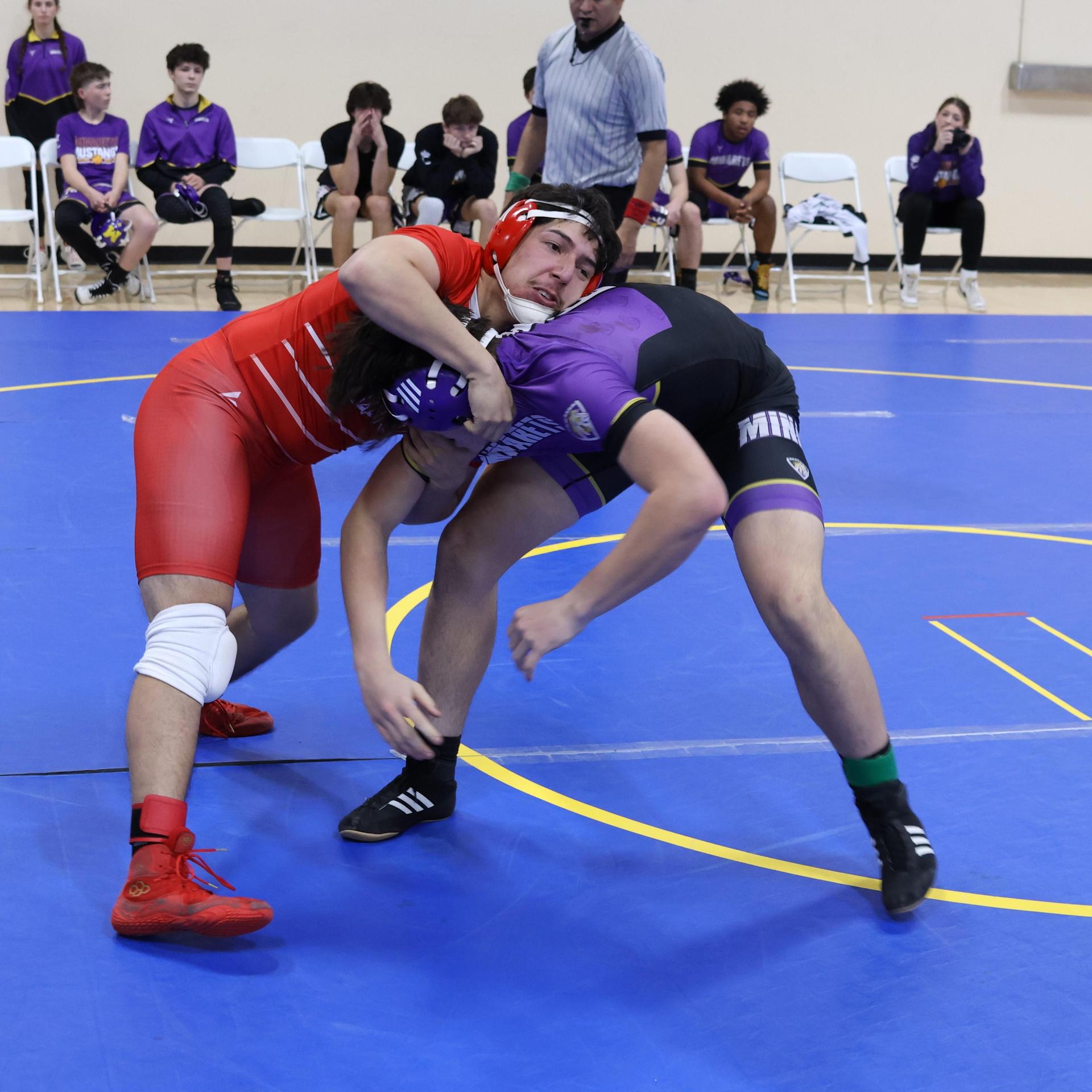 wrestlers in action at parlier