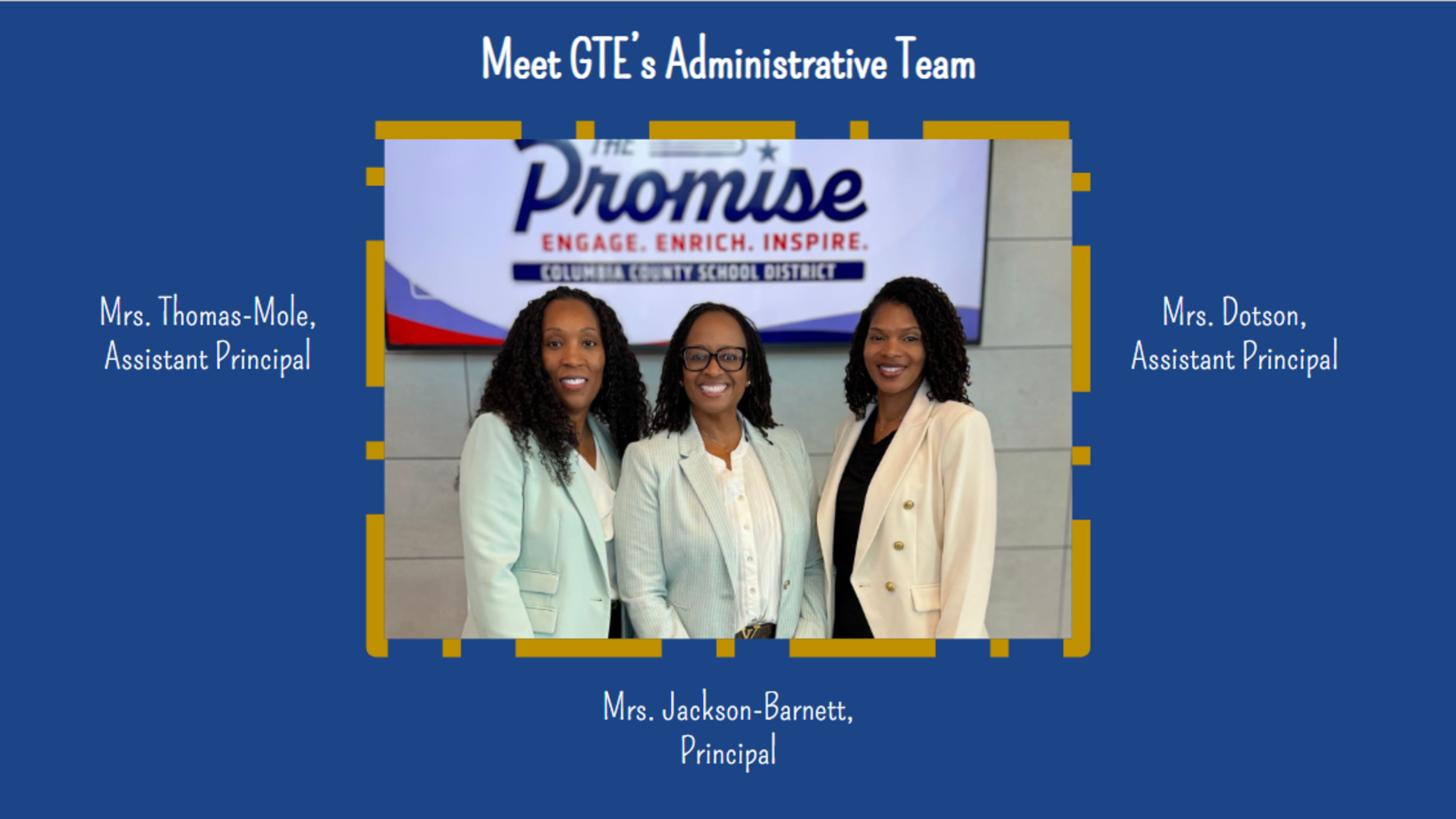 Three administrators (Mrs. Thomas-Mole, Assistant Principal, Mrs. Jackson-Barnett, Principal, and Mrs. Dotson, Assistant Principal, standing in front of a colorful school banner with names listed.