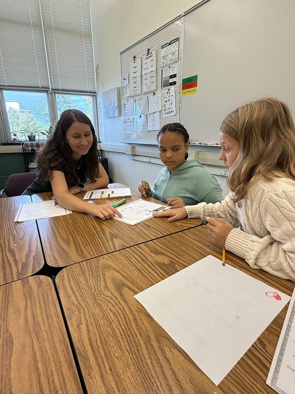 Lydia providing Language support for Middle Schoolers