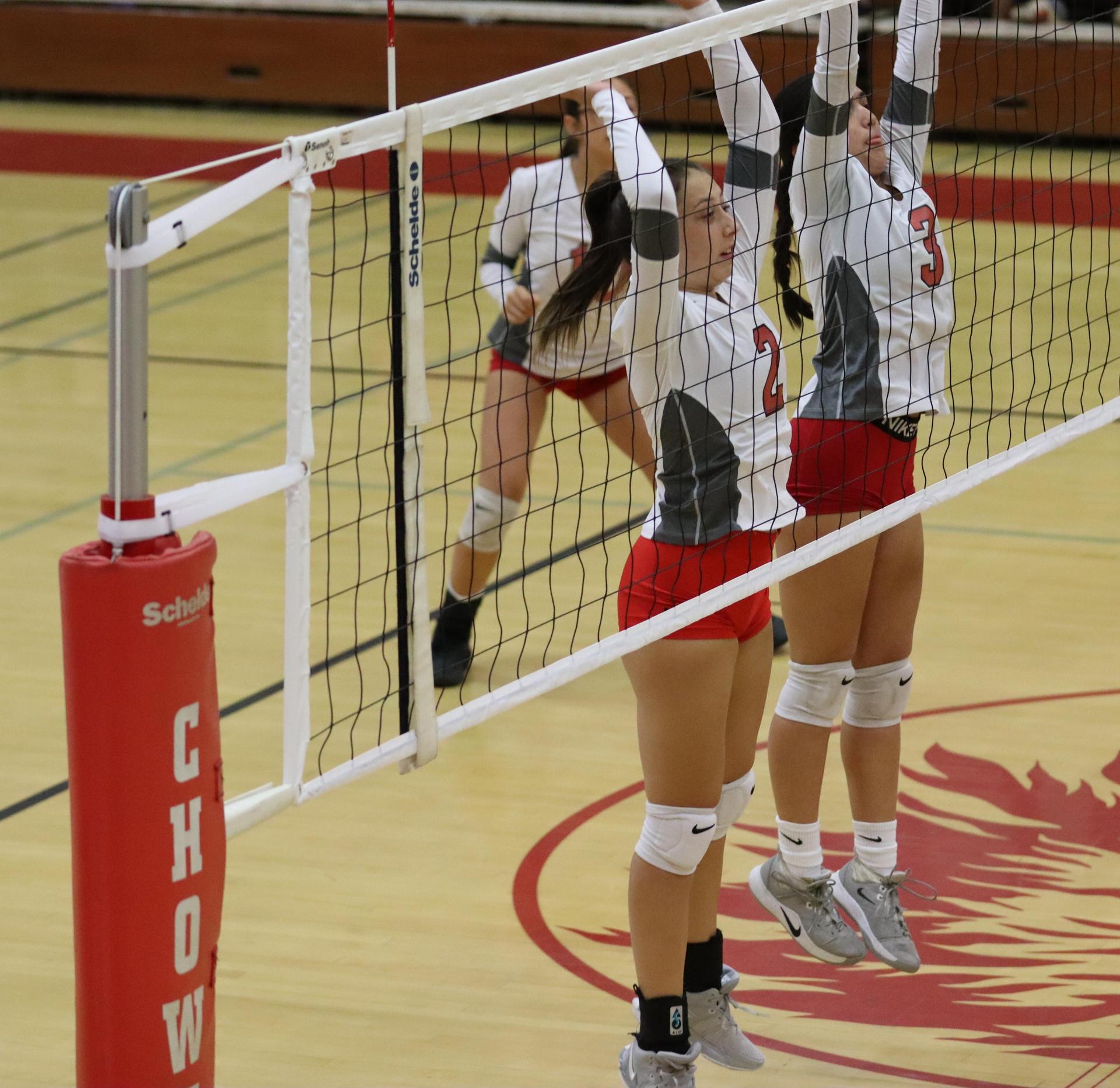 junior varsity girls playing volleyball against Liberty