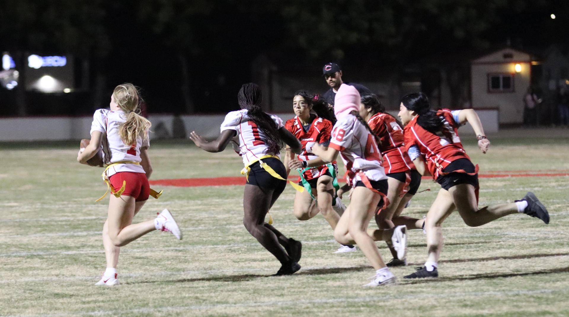 girls playing flag football