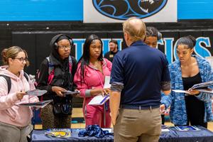 High school students chat with college and career reps