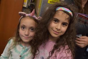 Two friends enjoying the fall festival