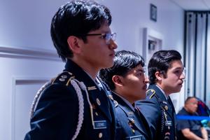 3 students in army uniforms at Board Meeting