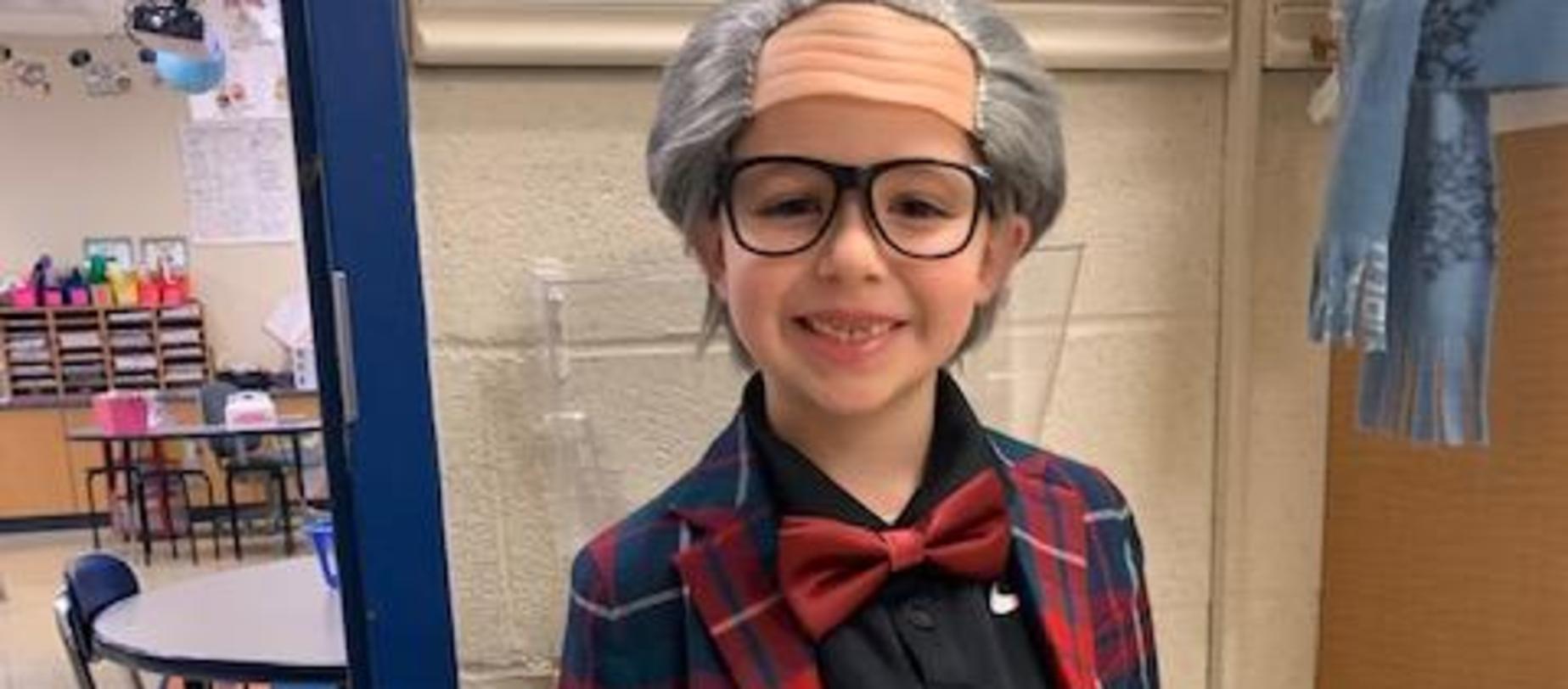 student dressed like he's 100 years old