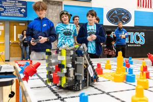 A team pilots a robot