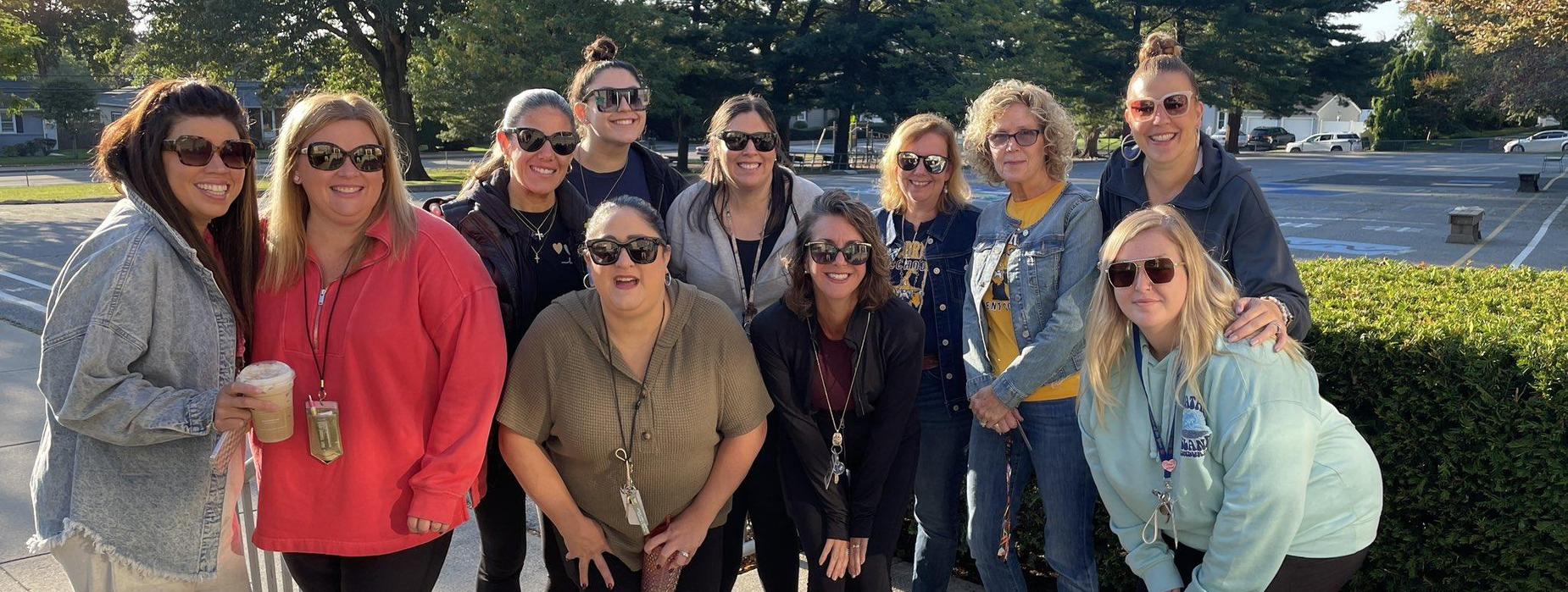 Woodridge staff pose together on Safe Walk to School Day.