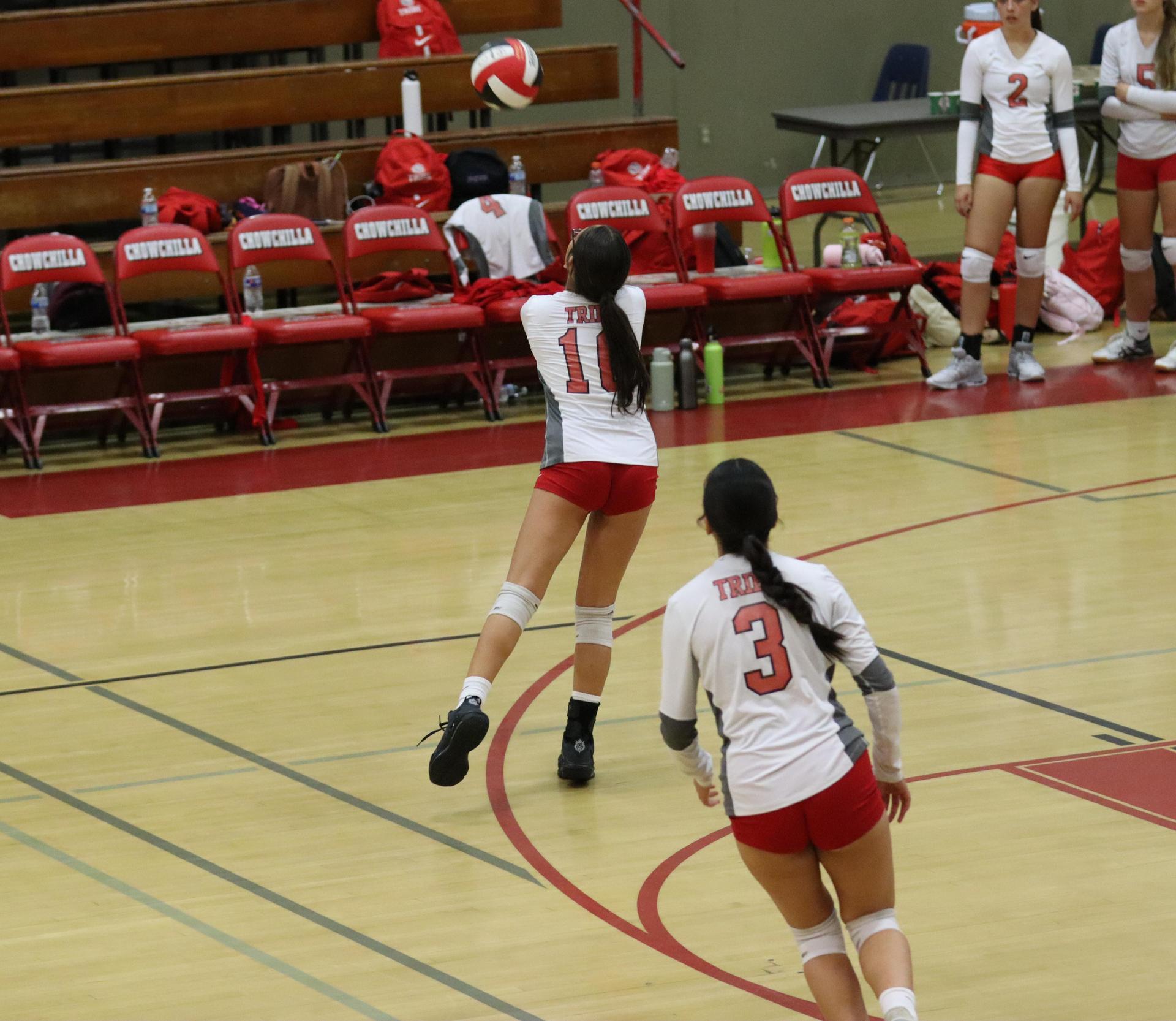 junior varsity girls playing volleyball against Liberty