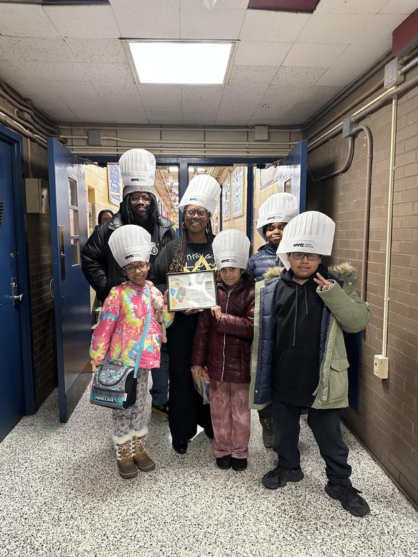 Ms Marshall with the students and their certificates