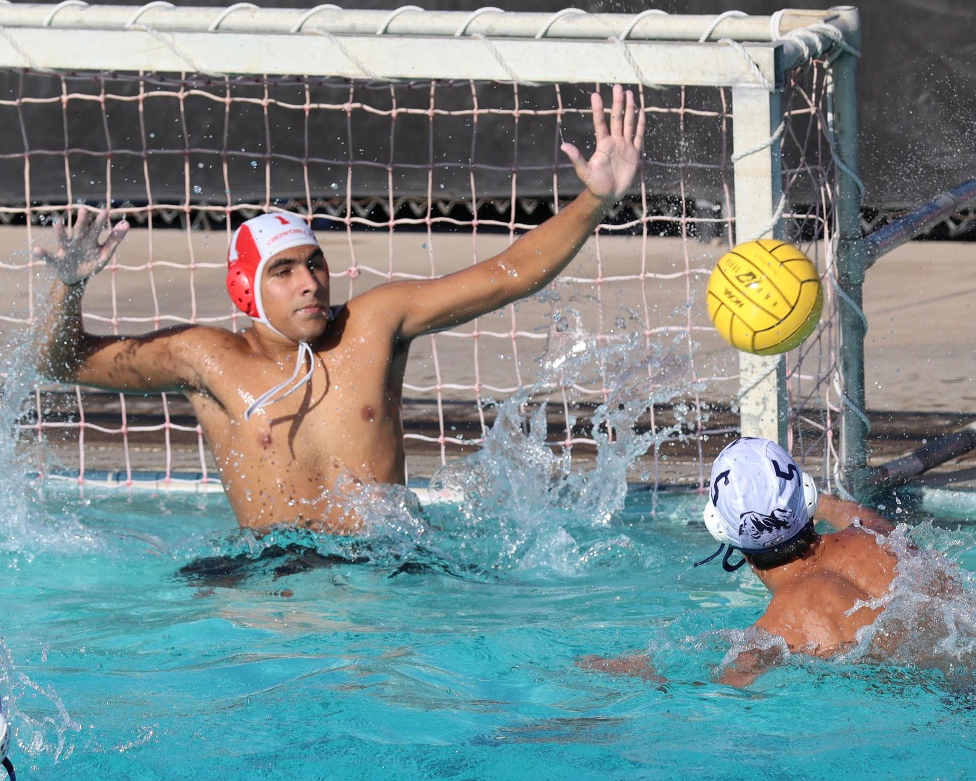 Boys playing water polo against Yosemite