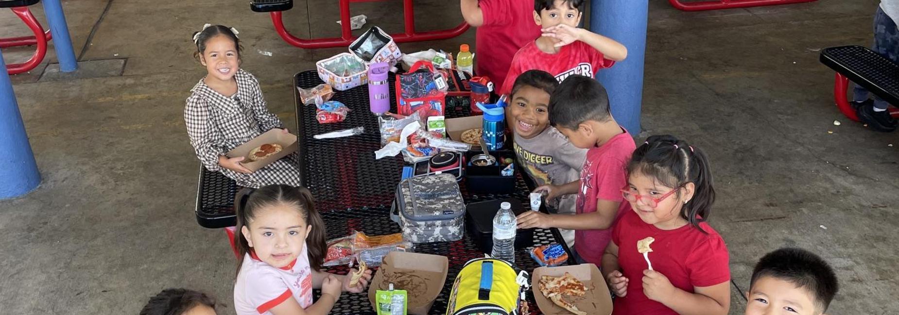 Kinder kids enjoying their lunch